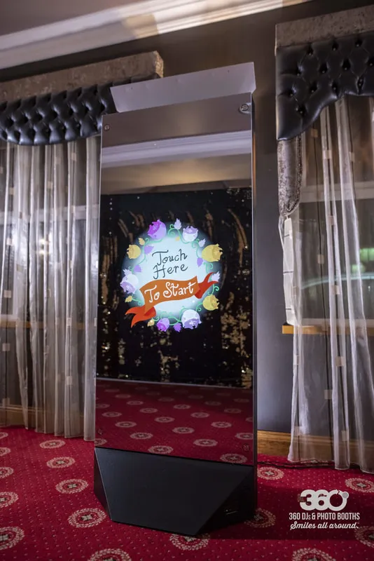 Mirror X photo booth with sleek full-length mirror design at a wedding